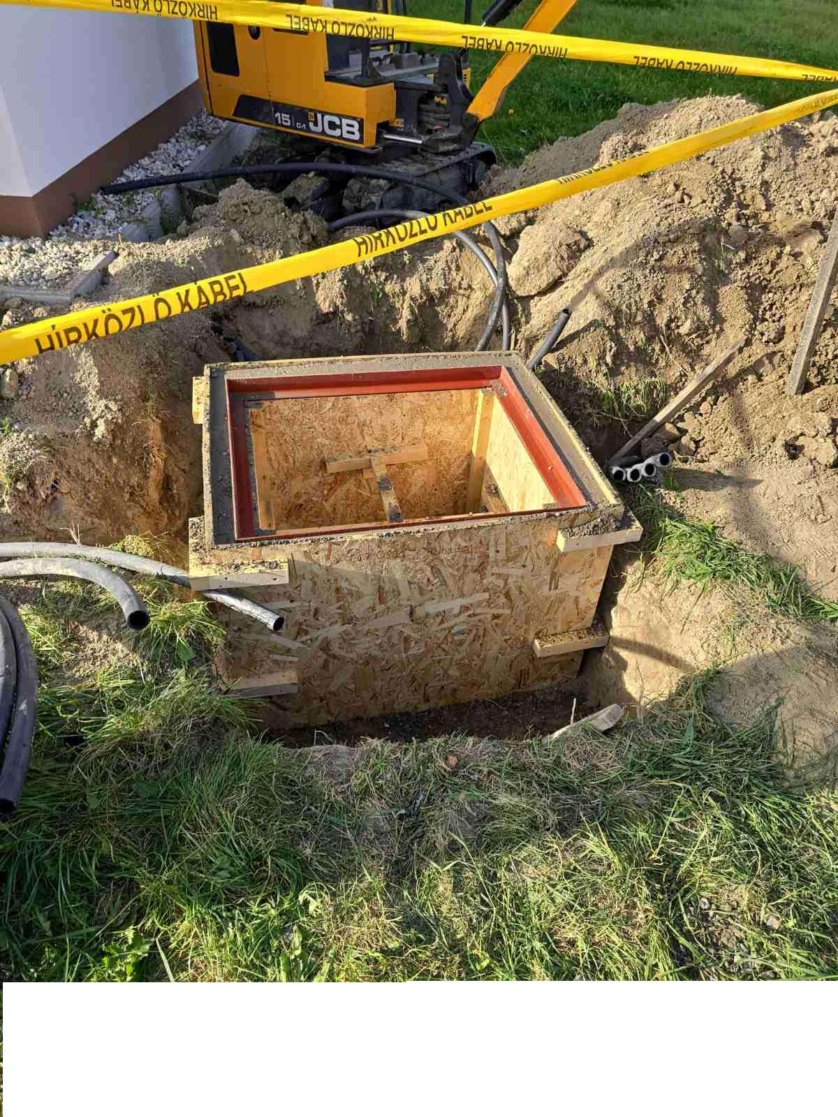 JCB kotró munka közben