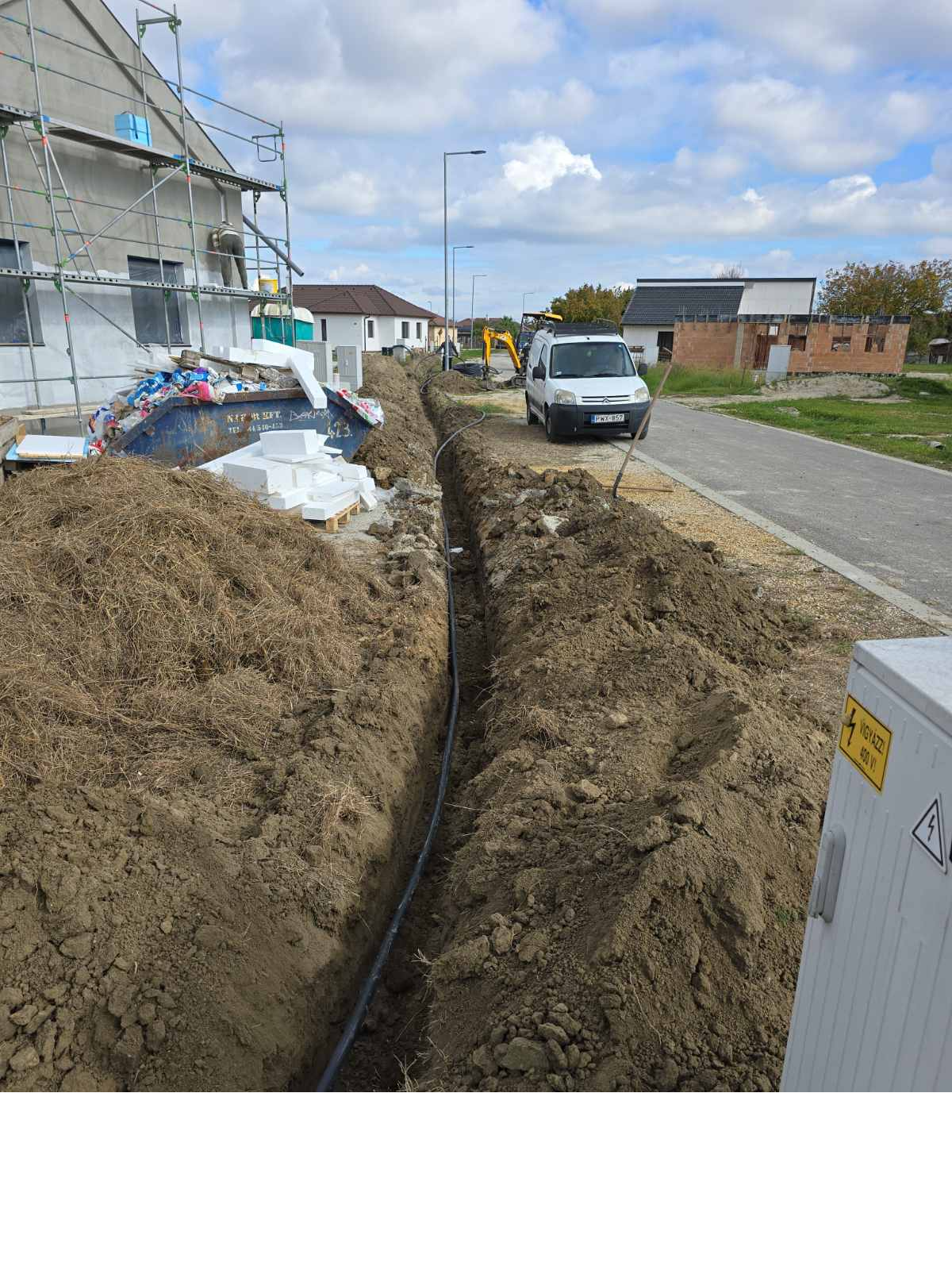 JCB kotró munka közben